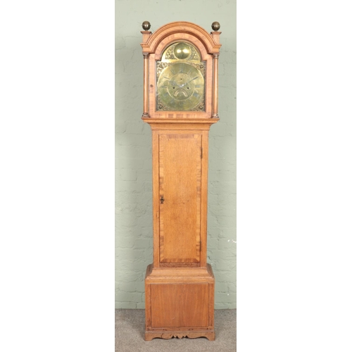 633 - A Nineteenth Century oak longcase clock, with brass dial labelled for James Todd, Bradford. Featurin... 