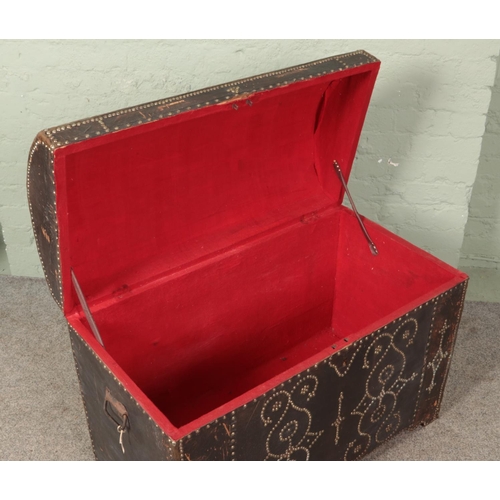 611 - An antique Eastern style trunk with studded decoration. 70cm x 90cm x 48cm.