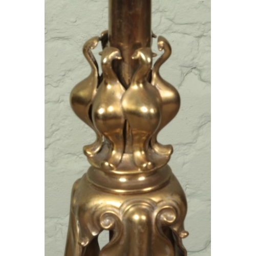 613 - A Victorian rise and fall adjustable brass oil standard lamp.