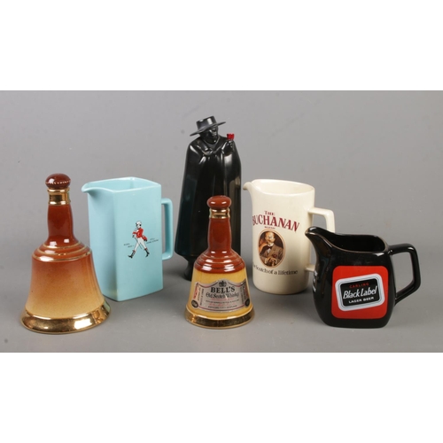 152 - A collection of breweriana. Includes Royal Doulton Sandeman decanter, Royal Doulton and Wade Bell's ... 