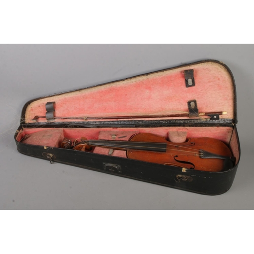 156 - A circa 1900 reproduction Josef Klotz two piece back violin. Bearing label to inside reading 