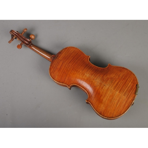 156 - A circa 1900 reproduction Josef Klotz two piece back violin. Bearing label to inside reading 