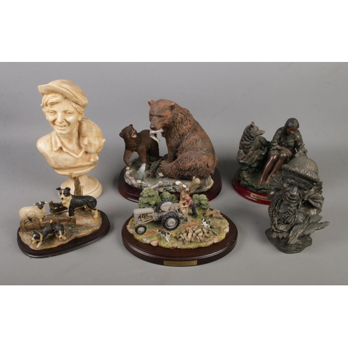 173 - A collection of figurines including a Danbury Mint Logging at Two Acre Field, Native American lady, ... 