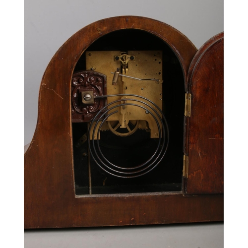 194 - A German inlaid mantle clock, c.1930's-1940's, featuring burr walnut and mother of pearl decoration.