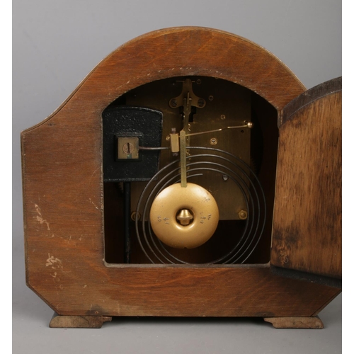 196 - An Andrew oak cased mantle clock featuring Perivale movement.