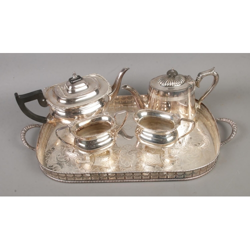 207 - A collection of silver plate tea wares to include Viners of Sheffield three part service with tray a... 