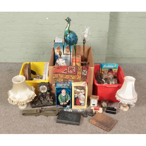 259 - Three boxes of miscellaneous. Includes table lamps, books, military web belt, clocks etc.