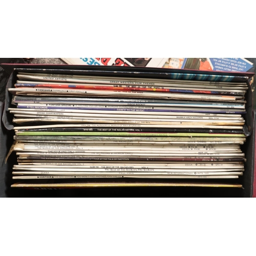 284 - A carry case and small box of records. Includes LP and single examples; The Monkees, The Beach Boys ... 