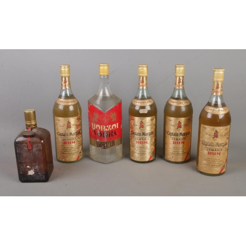 290 - A collection of sealed alcohol to include Contreau, Borzoi Vodka and Captain Morgan Rum.