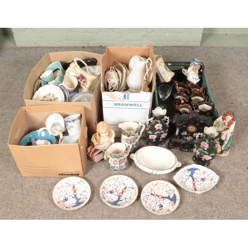 297 - Four boxes of miscellaneous. Includes Victorian ceramics, pottery clock garniture, copper lustre jug... 