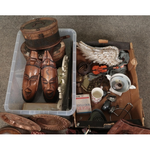 306 - Two boxes of miscellaneous. Includes tribal masks, bicycle clock, bags, storage boxes etc.