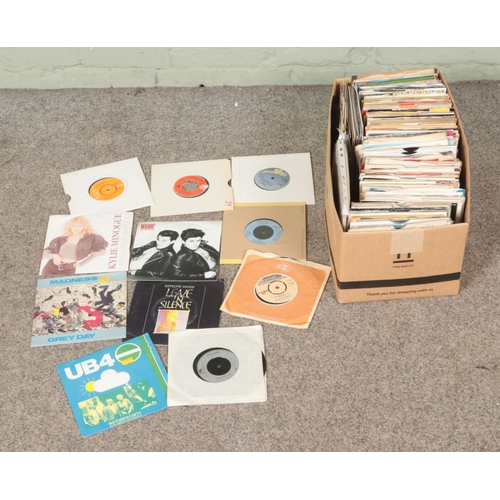 319 - A box of assorted vinyl singles of mainly pop and easy listening to include Michael Jackson, Abba, D... 