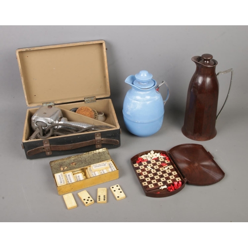 331 - A box of mainly bakelite items to include miniature travel chess set, Woodbine Cigarettes dominoes, ... 