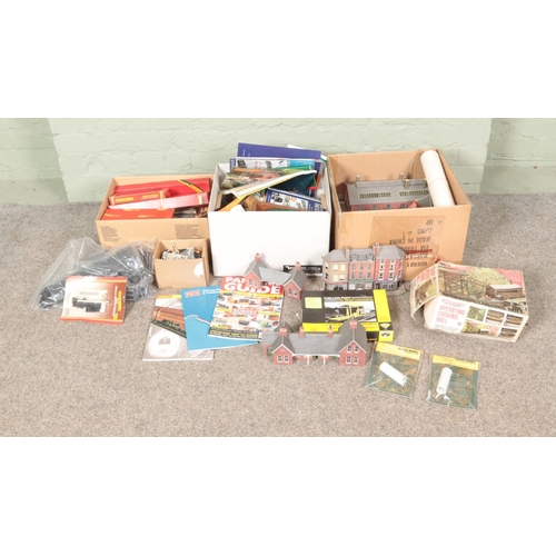 348 - Three boxes of assorted model railway scenery, boxed kits and diorama supplies to include Hornby, Me... 