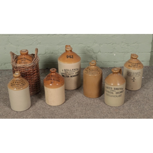 381 - A collection a mixed stoneware flagons with marks for J.Bollands, Offilers Brewery, T.Markham, J.H.W... 