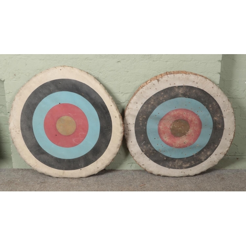 395 - A pair of straw bound archery targets 

Diameter 90cm