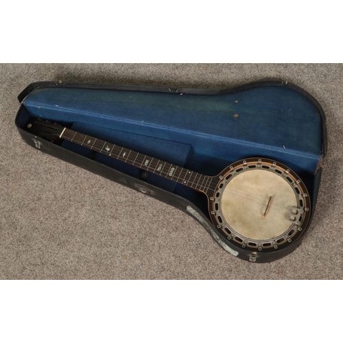 399 - A Barnes & Mullins six string guitar banjo featuring mother of pearl inlay to fretboard. With origin... 