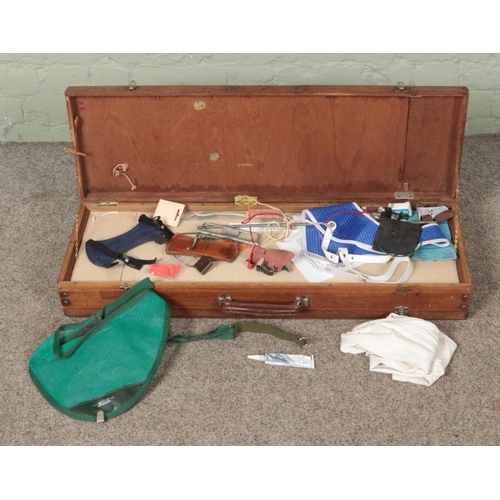 400 - An Apollo 'Kestrel' two piece steel bow housed in vintage double sided carry case. Includes various ... 