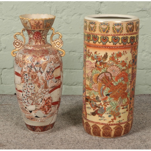 410 - Two pieces of oriental ceramics to include large twin handled vase and umbrella/stick stand.