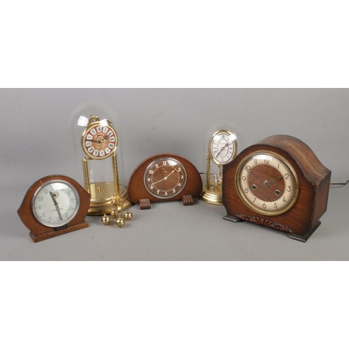 414 - A collection of clocks to include Smith's, Metamec and Eurastyle examples.