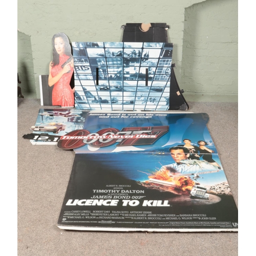 445 - A collection of James Bond promotional film advertisement displays to include License to Kill, Tomor... 