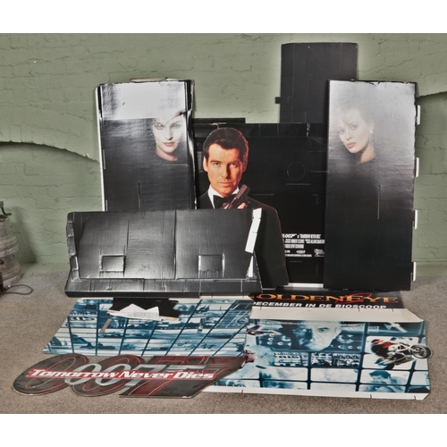 446 - A collection of James Bond promotional film advertisement displays to include Goldeneye, Tomorrow Ne... 