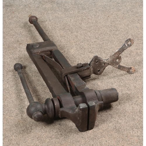 453 - A vintage blacksmiths iron vice. Lengthx99cm