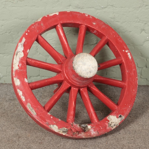 454 - A large chunky wooden cart wheel 


Diameter 86cm approx