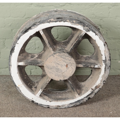 457 - A large wooden wheel 

Diameter 66cm approx