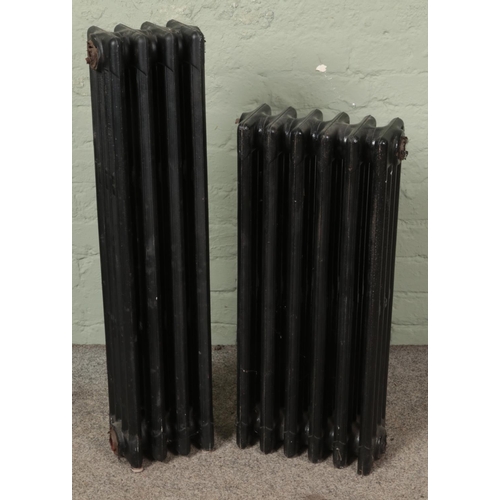 462 - Two cast iron radiators one being four-bar and other being six-bar.