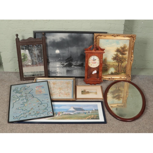 490 - A collection of pictures, mirrors, needle works and a wall clock.