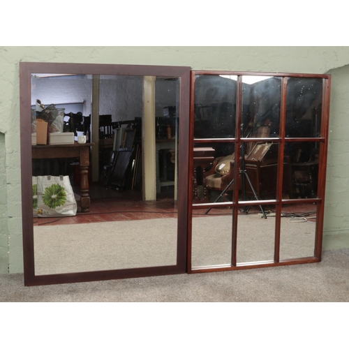 496 - Two very large decorative wooden mirrors. Largest 101cm x 86cm.