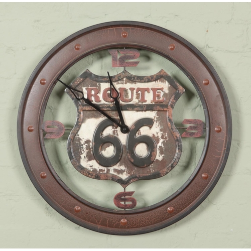 516 - A rustic style Route 66 quartz wall clock. Diameter 60cm.