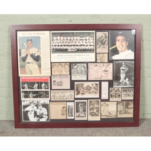 519 - A large framed baseball display with copies of newspaper clippings and pictures relating to Joe DiMa... 