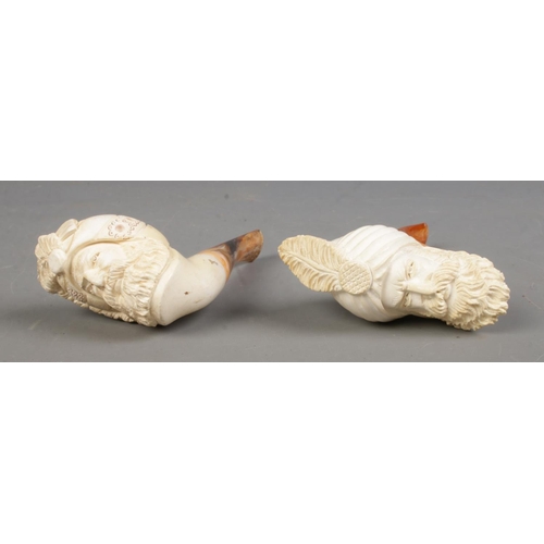 561 - Two carved figural Meerschaum pipes depicting bearded men wearing turbans with simulated tortoise sh... 