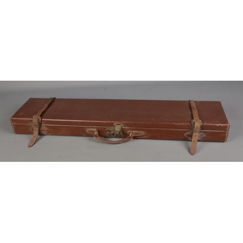 88 - A Midland Gun Co gun case with fitted red interior.

83cm long