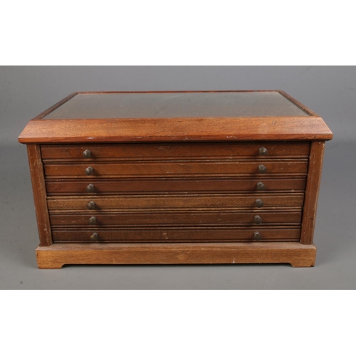 589 - A mahogany table top coin/medal collectors cabinet with six drawers and fitted interior.

Hx24cm
Wx4... 