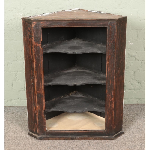 592 - An oak corner cabinet

Hx89cm