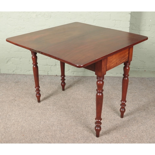 598 - A Victorian mahogany fold over table.