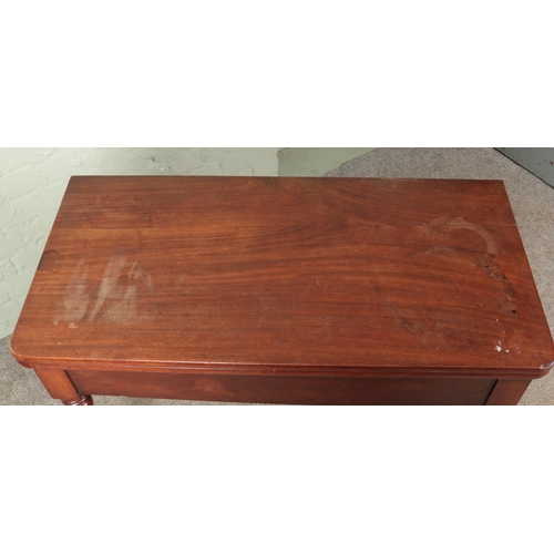 598 - A Victorian mahogany fold over table.