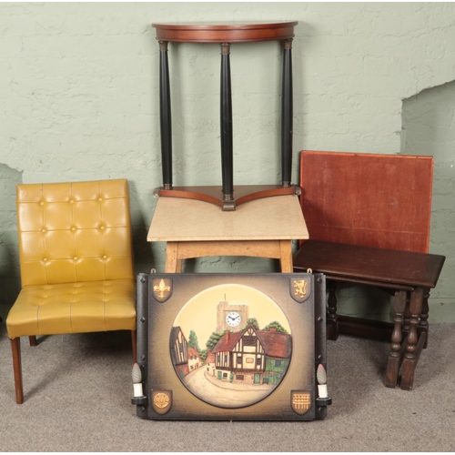 622 - A quantity of furniture. Includes side tables, wall clock, retro leatherette chair, etc.