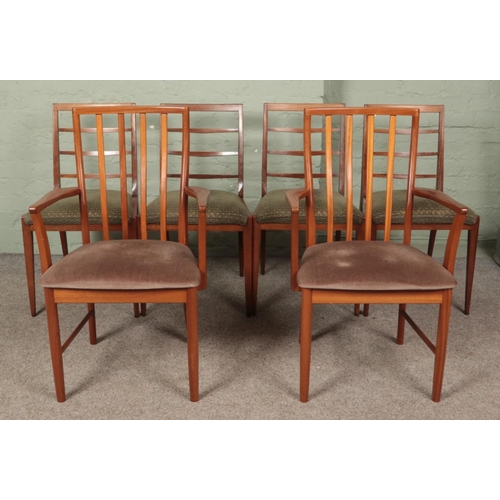 627 - A Mid-Century teak McIntosh extending dining table, with additional leaf and six McIntosh dining cha... 