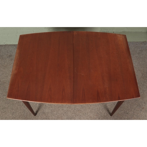 627 - A Mid-Century teak McIntosh extending dining table, with additional leaf and six McIntosh dining cha... 