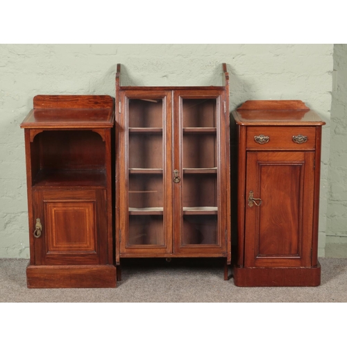 629 - Two mahogany pot cupboards one with banded inlay, together with a hanging wall mounted display cabin... 