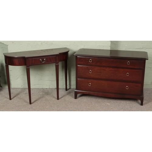 632 - A mahogany Stag chest of three drawers, together with a modern console table.