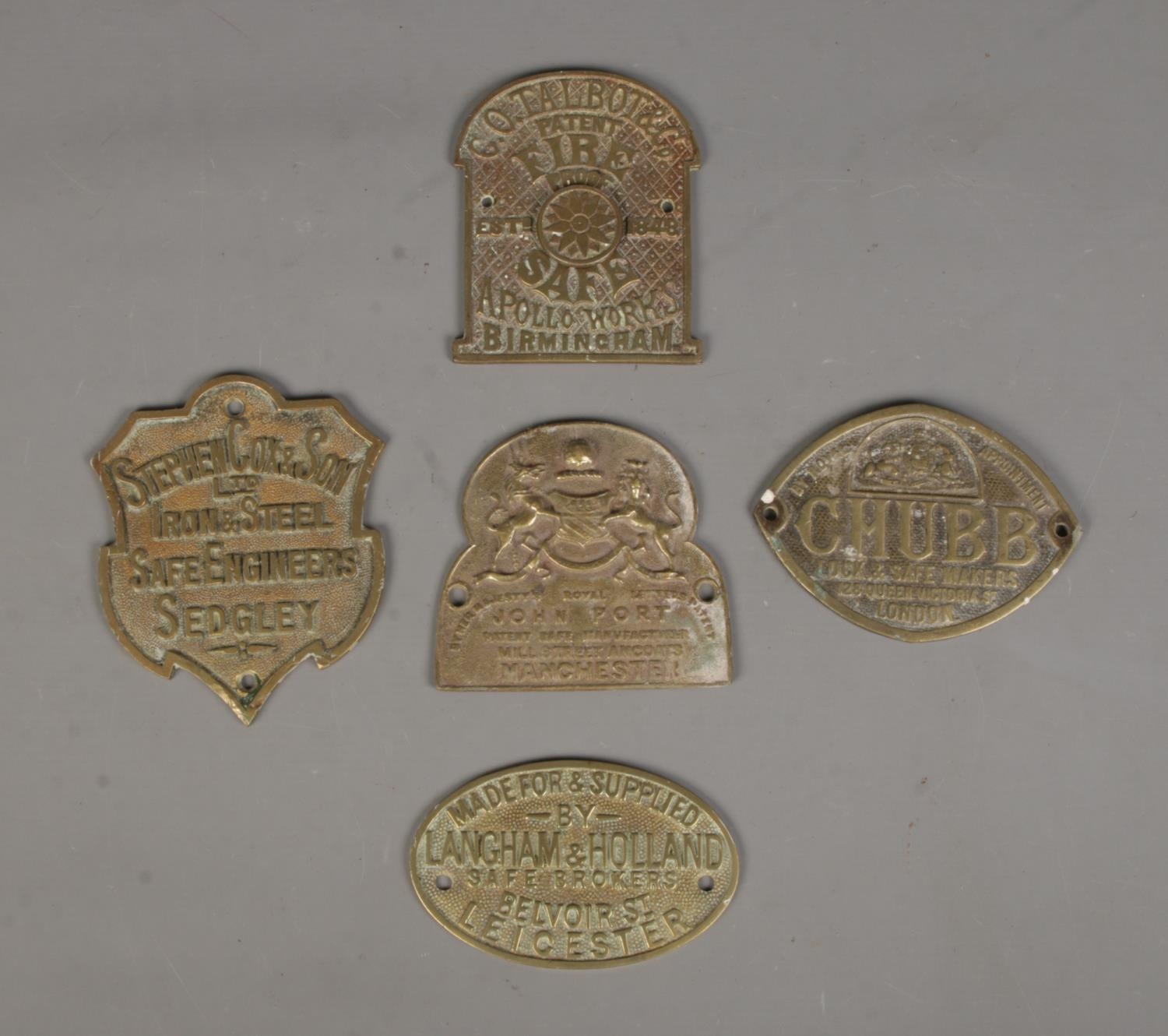 Five brass safe plates, including Chubb, Stephen Cox and Son Ltd ...