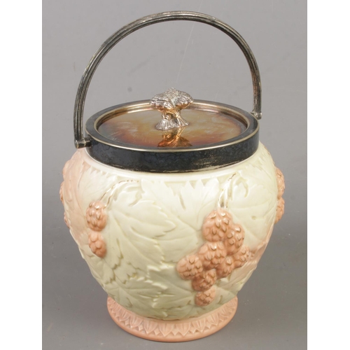 143 - A Locke & Co Worcester ceramic biscuit barrel with metal lid and swing handle.