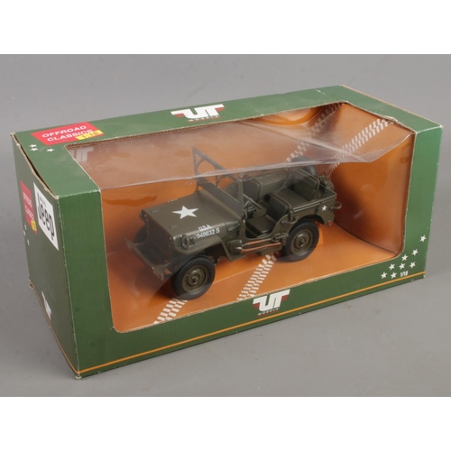 168 - A boxed UT Models Willy's Jeep die cast 1:18 model.