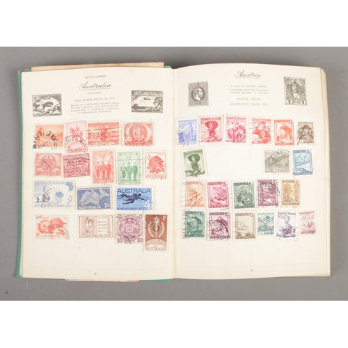 200 - A collection of assorted ephemera, to include two partially filled stamp albums, autograph books fea... 