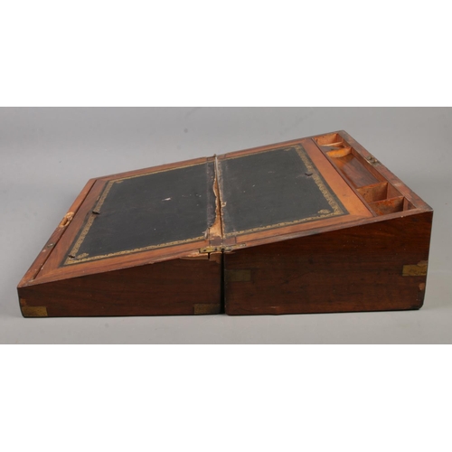 204 - A Victorian mahogany writing box, with leather insert, pen tray, inkwell and storage. Height: 18cm, ... 